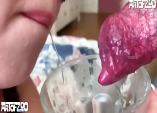 Dog cums into a glass so this lady could enjoy